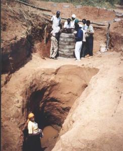 Hand-dug well next to a waterhole